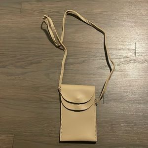 Brand new condition bag with a place for your phone!